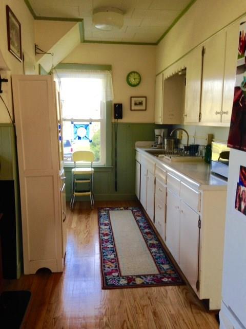 585 East Side Road Hancock, ME 04640 - Photo 6 of 24 Kitchen with lovely hardwood floor