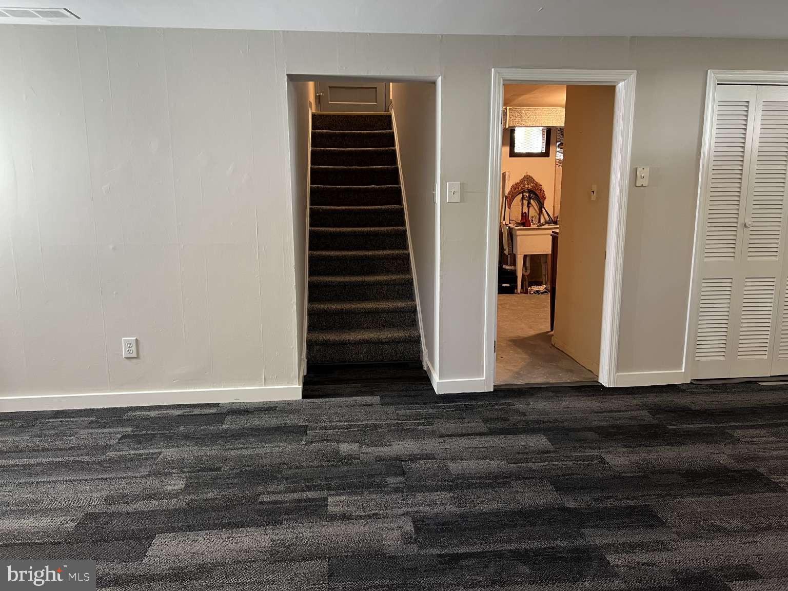 41 Fremont Road Newark, DE 19711 - Photo 16 of 25 a view of an entryway with wooden floor and door