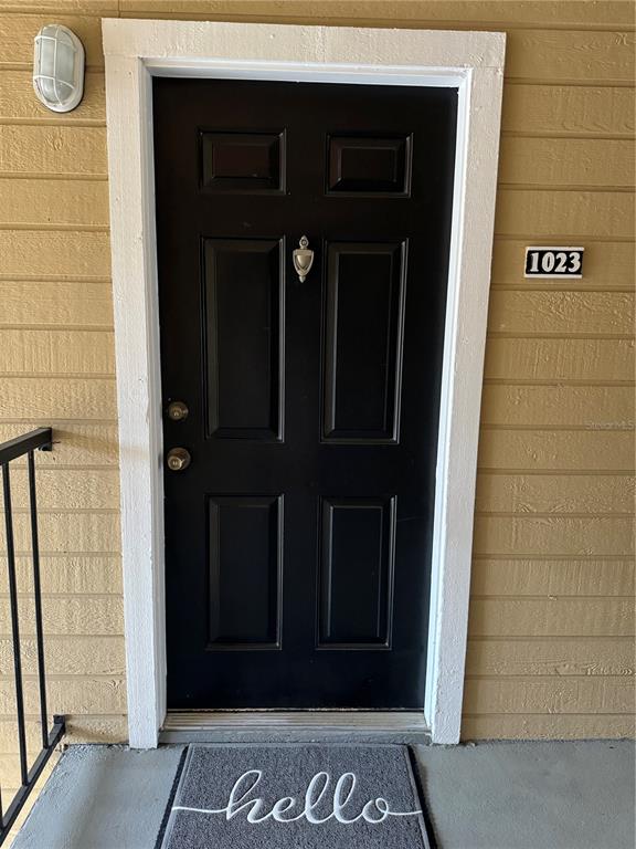 1073 South Hiawassee Road, Unit 1023 Orlando, FL 32835 - Photo 2 of 16 a view of front door