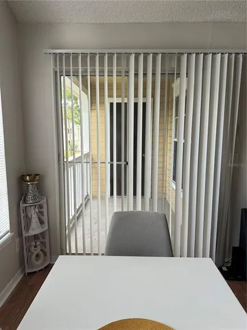 a view of a bedroom with furniture