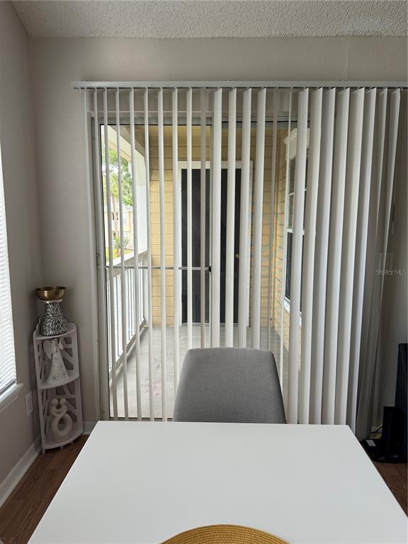 1073 South Hiawassee Road, Unit 1023 Orlando, FL 32835 - Photo 4 of 16 a view of a bedroom with furniture