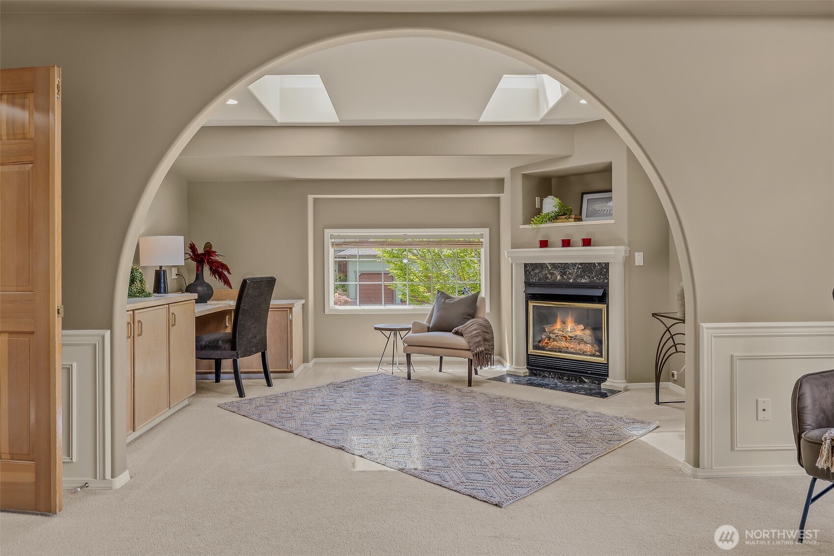 2323 241st Street Southeast Bothell, WA 98021 - Photo 33 of 40 a living room with furniture and a fireplace
