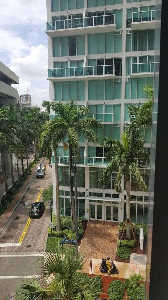 31 Southeast 6th Street, Unit 602 Miami, FL 33131 - Photo 20 of 39 a view of front a house with a yard