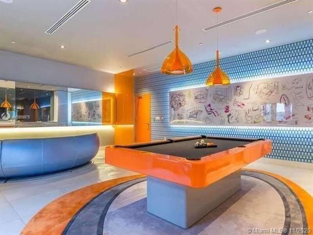 31 Southeast 6th Street, Unit 602 Miami, FL 33131 - Photo 27 of 39 a view of a living room and dining room