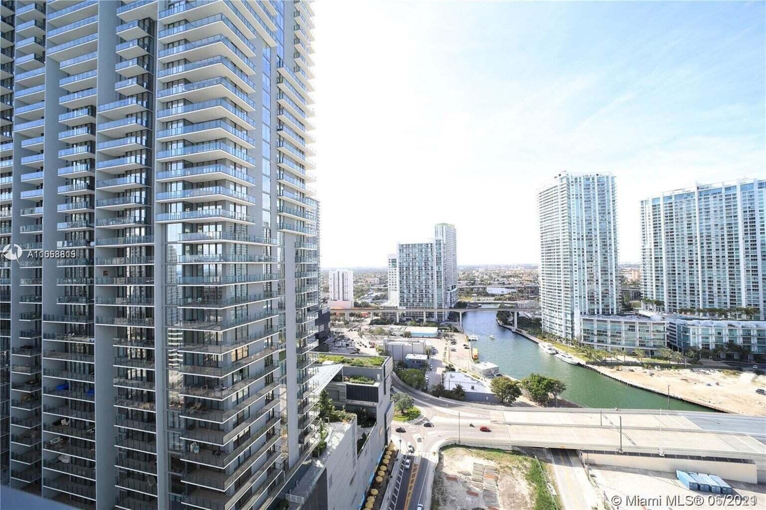 31 Southeast 6th Street, Unit 602 Miami, FL 33131 - Photo 30 of 39 a view of a city with tall buildings