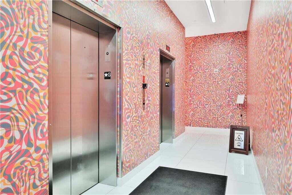 31 Southeast 6th Street, Unit 602 Miami, FL 33131 - Photo 37 of 39 a bathroom with a shower and a sink