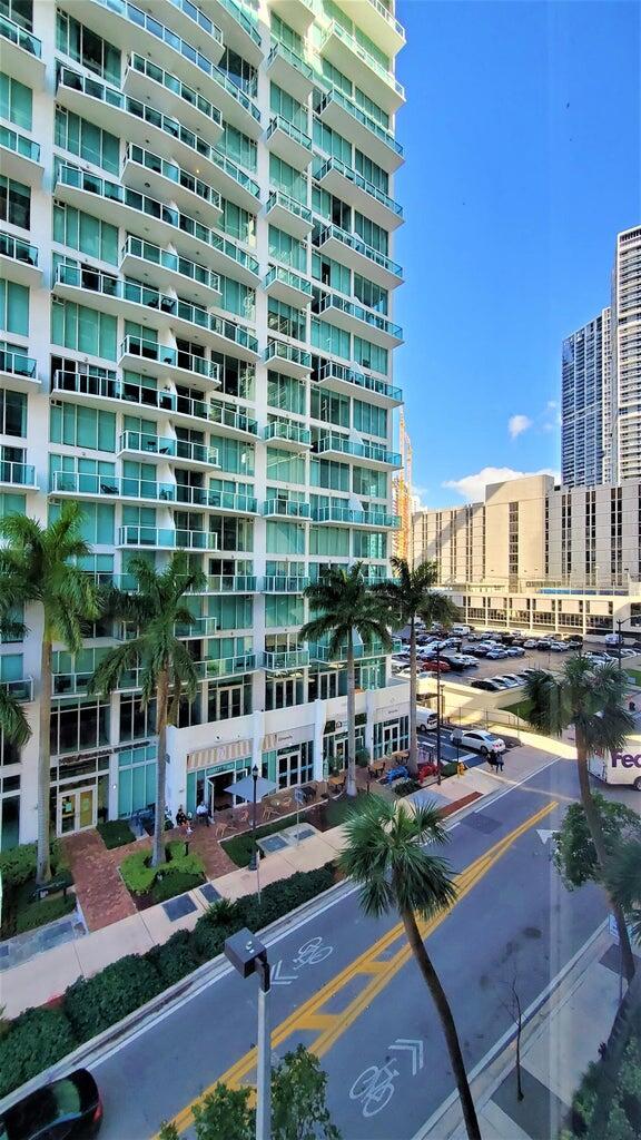 31 Southeast 6th Street, Unit 602 Miami, FL 33131 - Photo 8 of 39 a city view with tall buildings