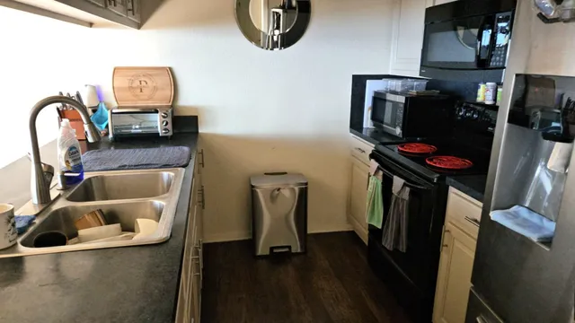 a view of workspace filled with furniture and toys