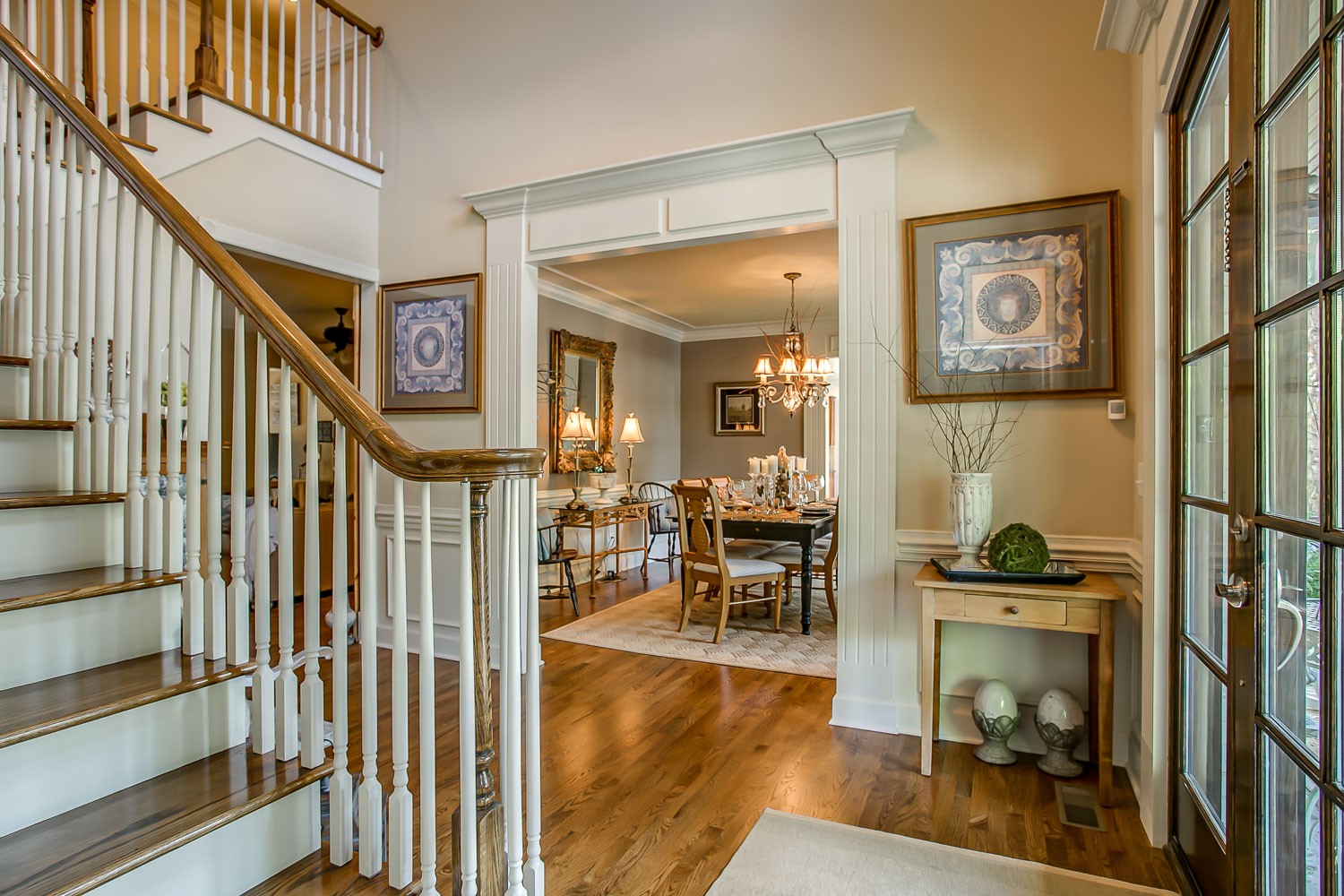 128 Deejay Drive Franklin, TN 37064 - Photo 14 of 50 a view of a hallway with wooden floor and dining room