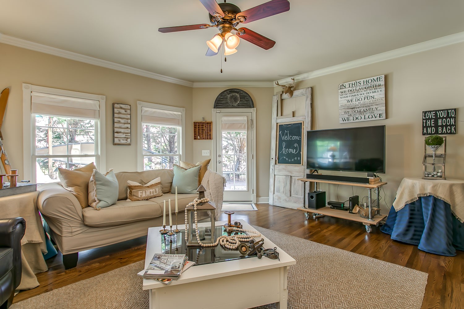 128 Deejay Drive Franklin, TN 37064 - Photo 23 of 50 a living room with furniture flat screen tv and a large window
