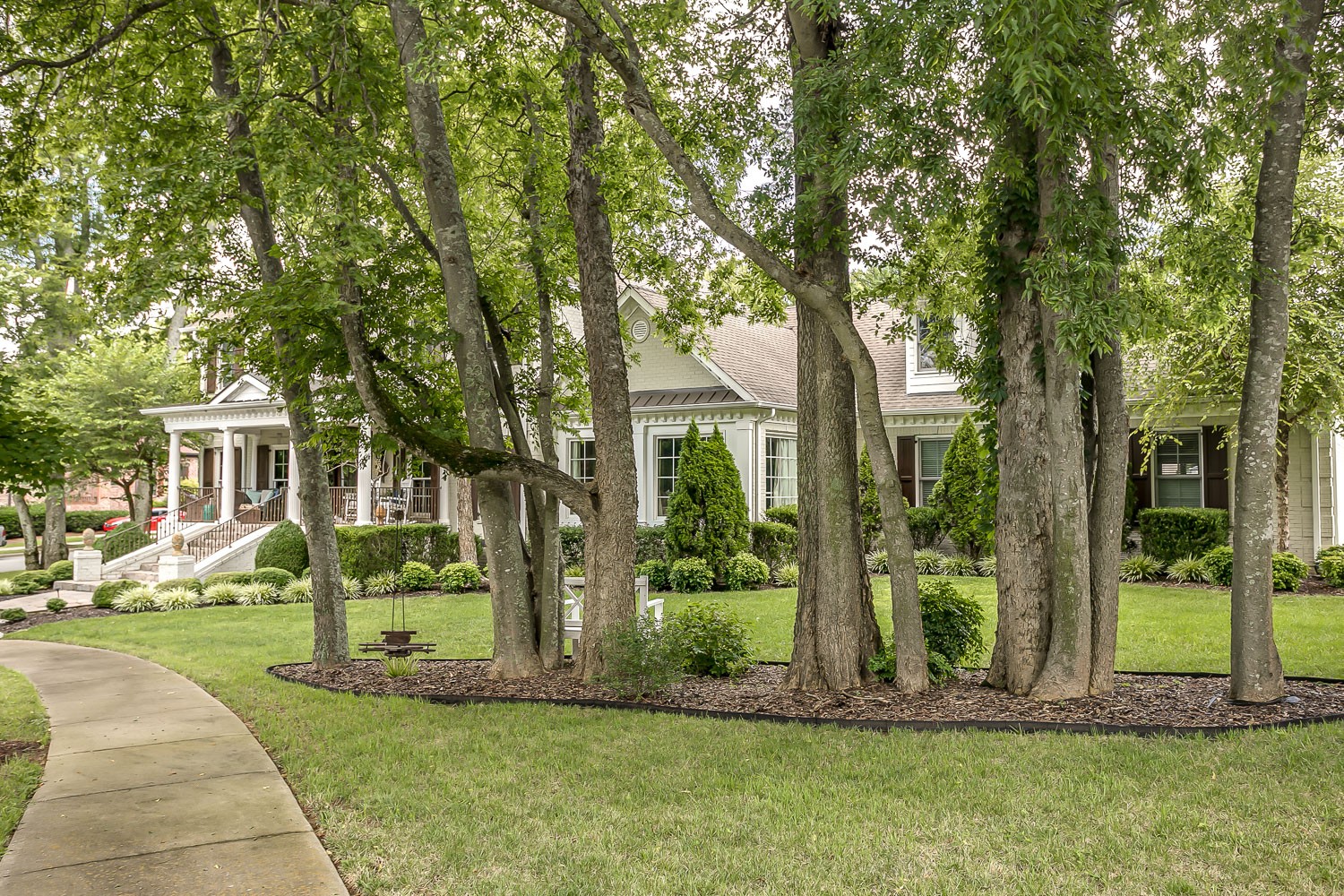 128 Deejay Drive Franklin, TN 37064 - Photo 3 of 50 a front view of a house with a yard