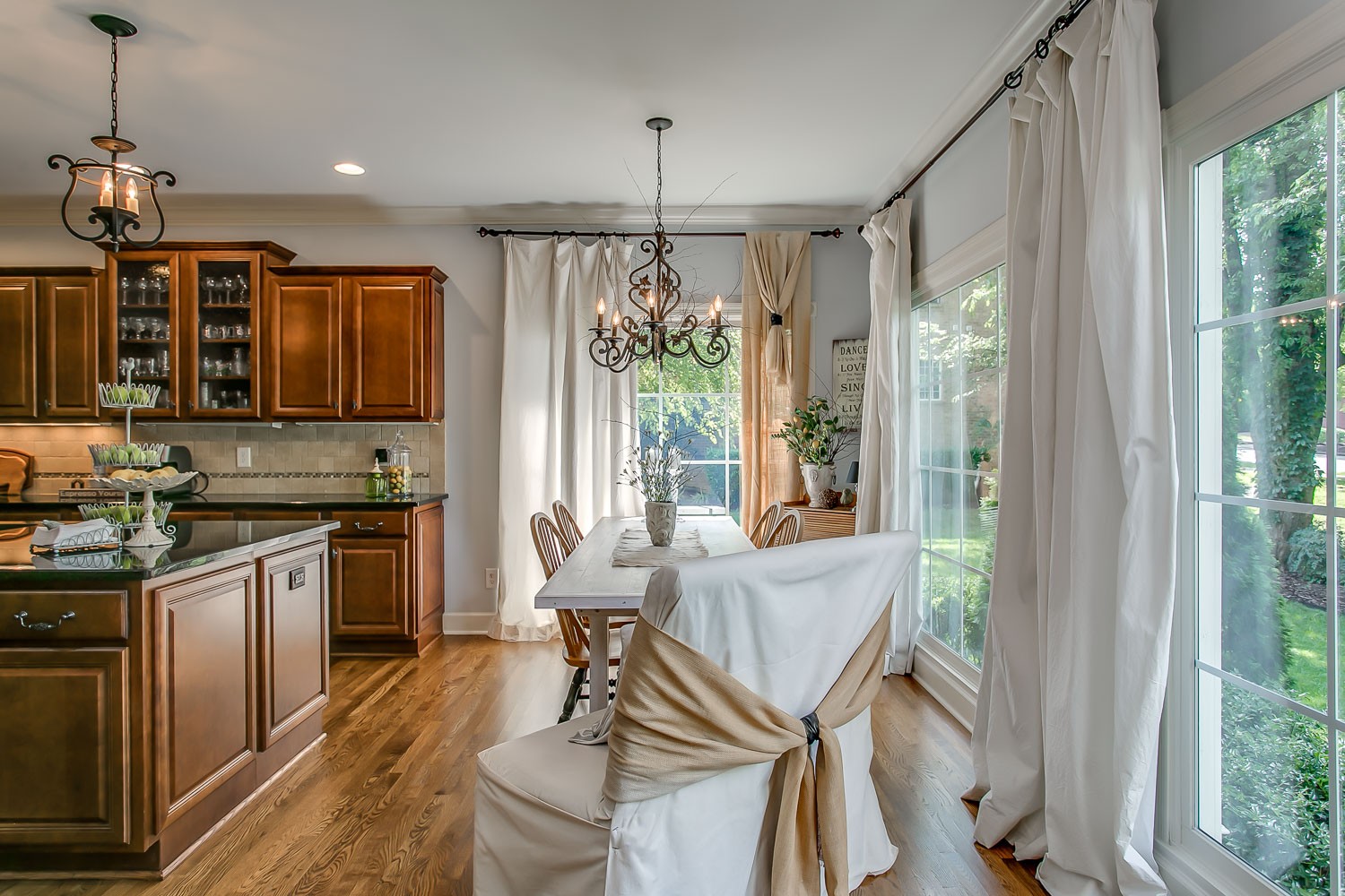 128 Deejay Drive Franklin, TN 37064 - Photo 32 of 50 a open kitchen with stainless steel appliances granite countertop a stove and a refrigerator