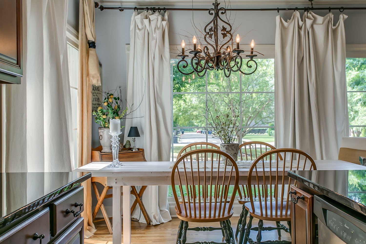 128 Deejay Drive Franklin, TN 37064 - Photo 33 of 50 a view of a porch with a table and chairs