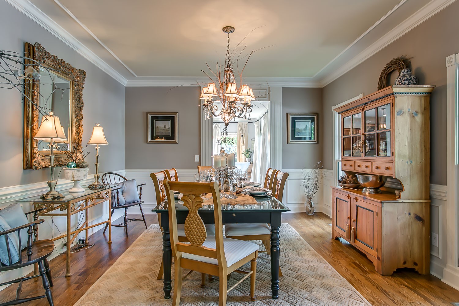 128 Deejay Drive Franklin, TN 37064 - Photo 35 of 50 a dining room with furniture a chandelier and window