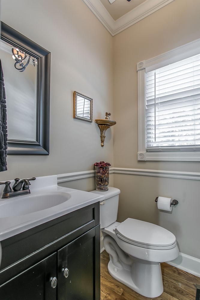 128 Deejay Drive Franklin, TN 37064 - Photo 38 of 50 a bathroom with a sink a toilet and a mirror