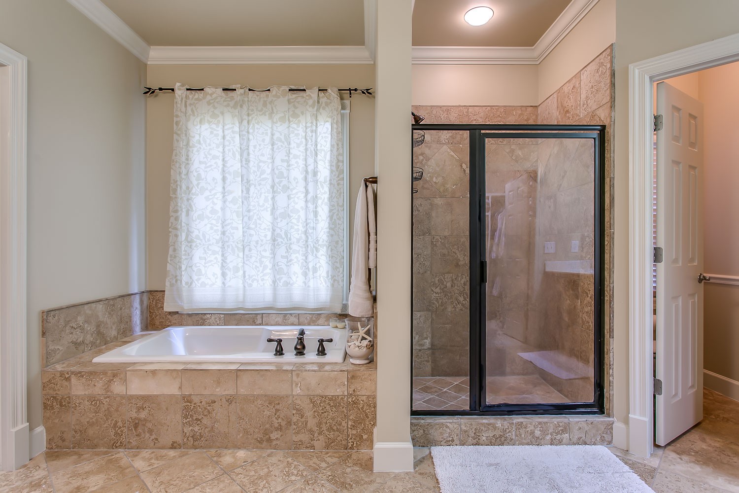 128 Deejay Drive Franklin, TN 37064 - Photo 42 of 50 a bathroom with a bathtub and a shower