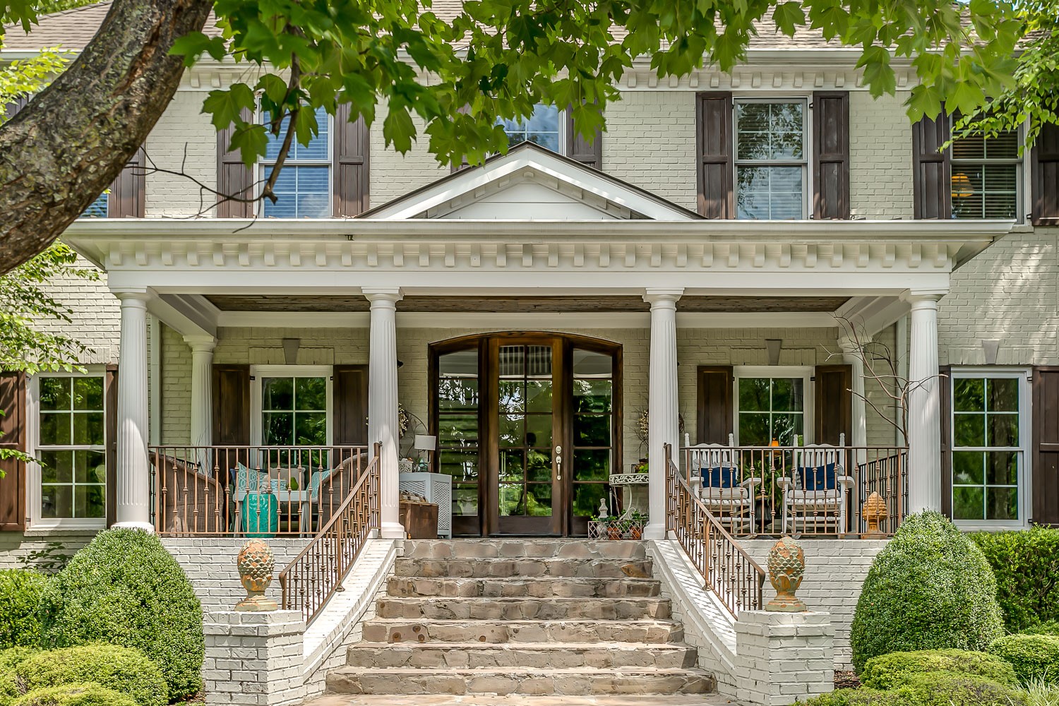 128 Deejay Drive Franklin, TN 37064 - Photo 6 of 50 front view of a house with a porch