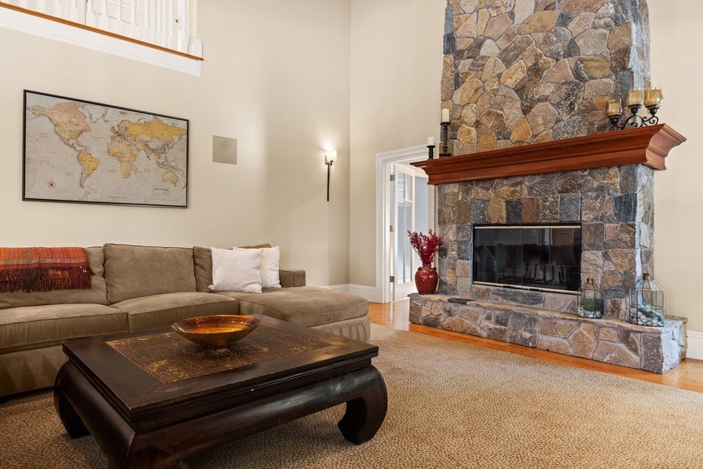 204 Cedar Street Lexington, MA 02421 - Photo 14 of 42 a living room with furniture and a fireplace