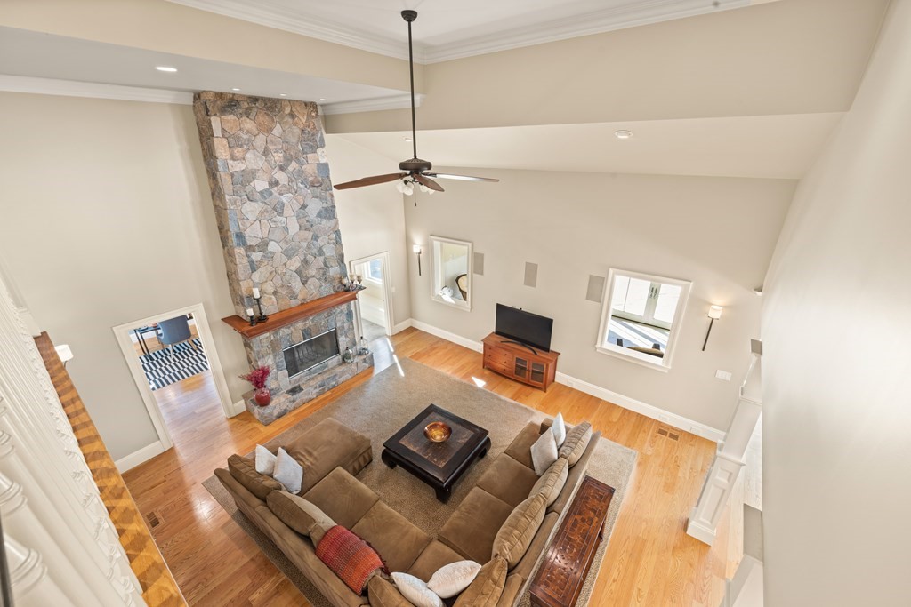 204 Cedar Street Lexington, MA 02421 - Photo 15 of 42 a living room with furniture and a chandelier