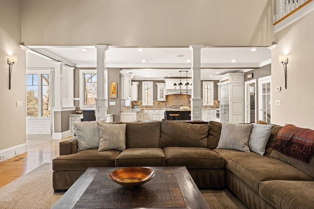 204 Cedar Street Lexington, MA 02421 - Photo 16 of 42 a living room with furniture and a large window