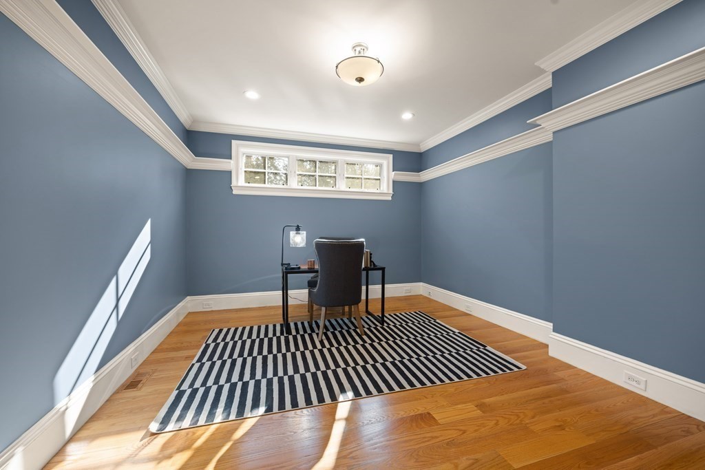 204 Cedar Street Lexington, MA 02421 - Photo 17 of 42 a view of a room with wooden floor