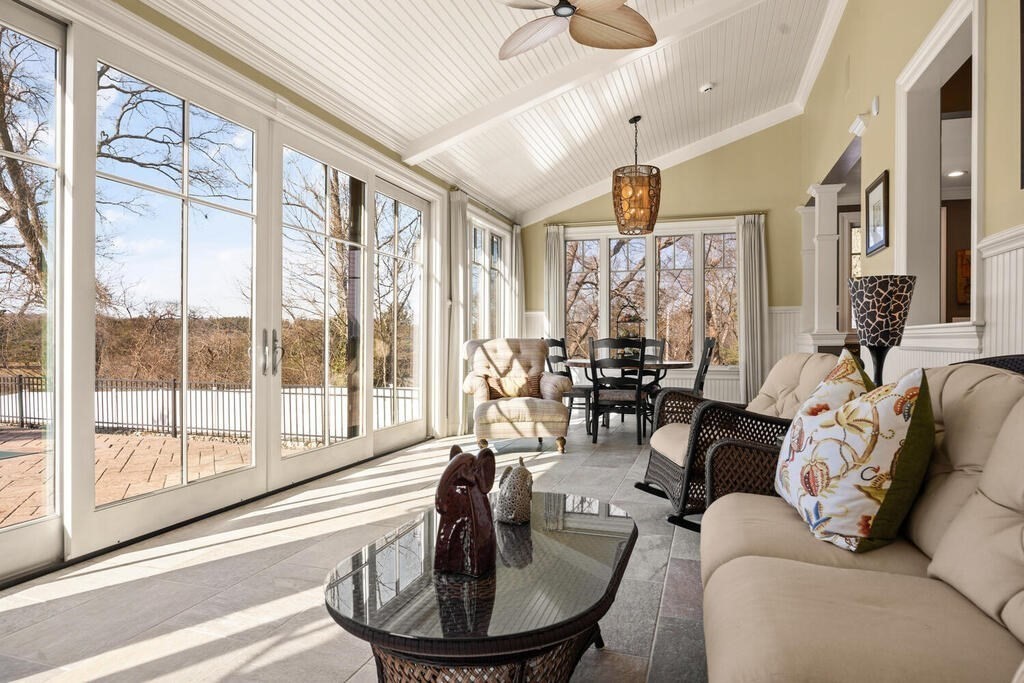 204 Cedar Street Lexington, MA 02421 - Photo 19 of 42 a living room with furniture and a large window
