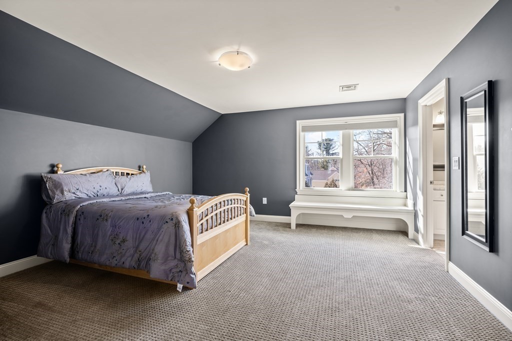204 Cedar Street Lexington, MA 02421 - Photo 30 of 42 a bedroom with a bed and a window