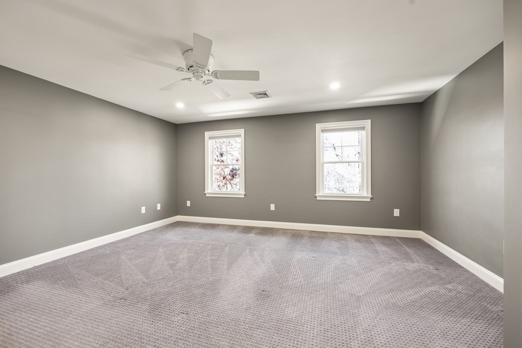 204 Cedar Street Lexington, MA 02421 - Photo 32 of 42 a view of an empty room with a window