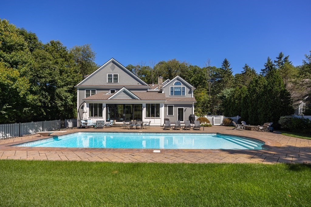 204 Cedar Street Lexington, MA 02421 - Photo 37 of 42 a front view of a house with a big yard