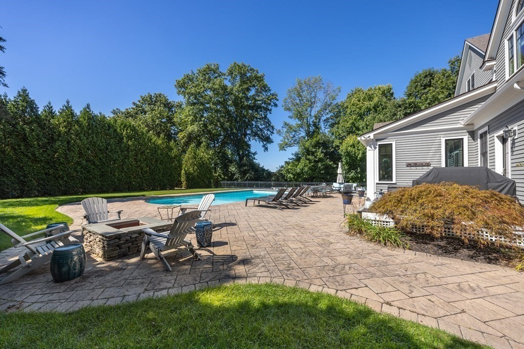 204 Cedar Street Lexington, MA 02421 - Photo 39 of 42 a view of backyard with swimming pool and outdoor seating