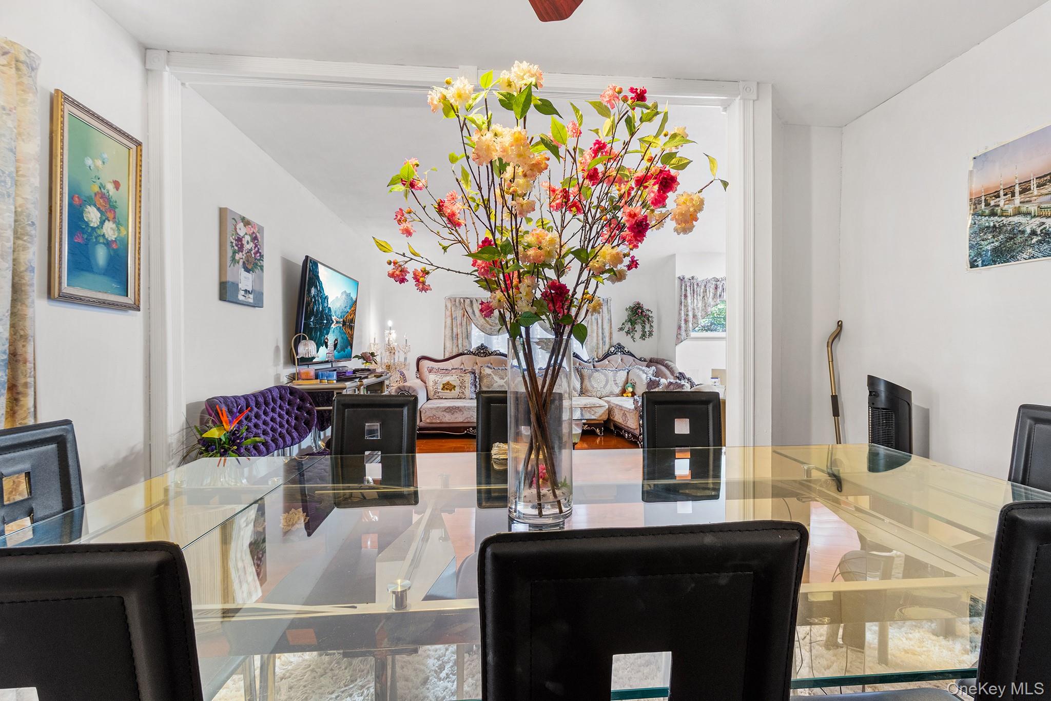 31 Holbrook Road Centereach, NY 11720 - Photo 13 of 27 a vase of flowers sitting on a table