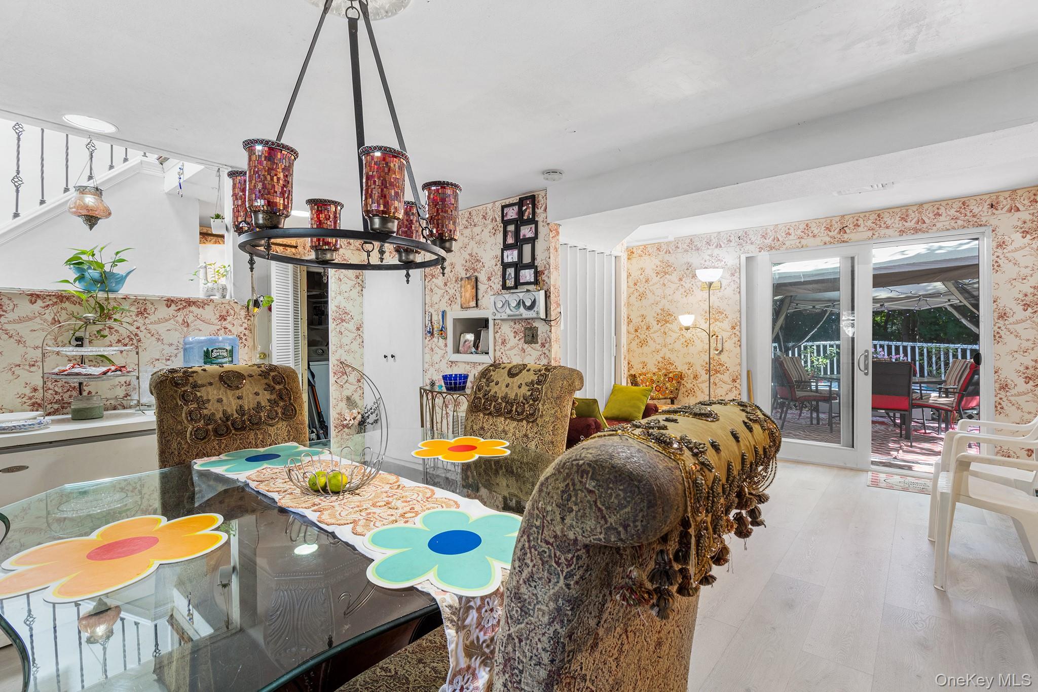 31 Holbrook Road Centereach, NY 11720 - Photo 5 of 27 a living room filled with furniture and chandelier