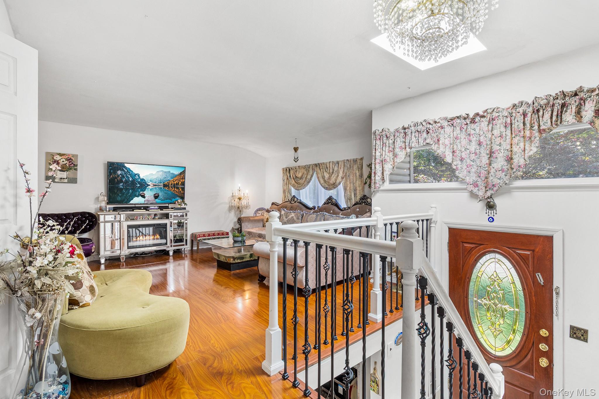 31 Holbrook Road Centereach, NY 11720 - Photo 8 of 27 a bedroom with furniture and a window