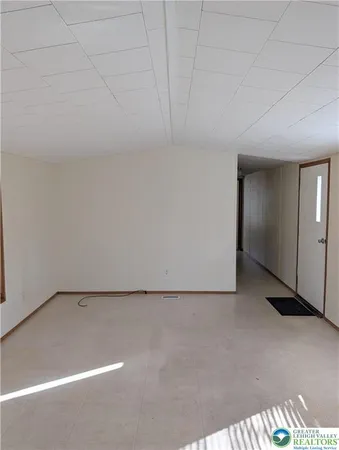 a view of a room with a barbeque