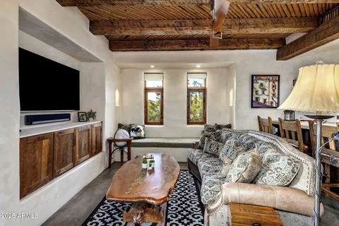 a kitchen with stainless steel appliances granite countertop a sink and a microwave