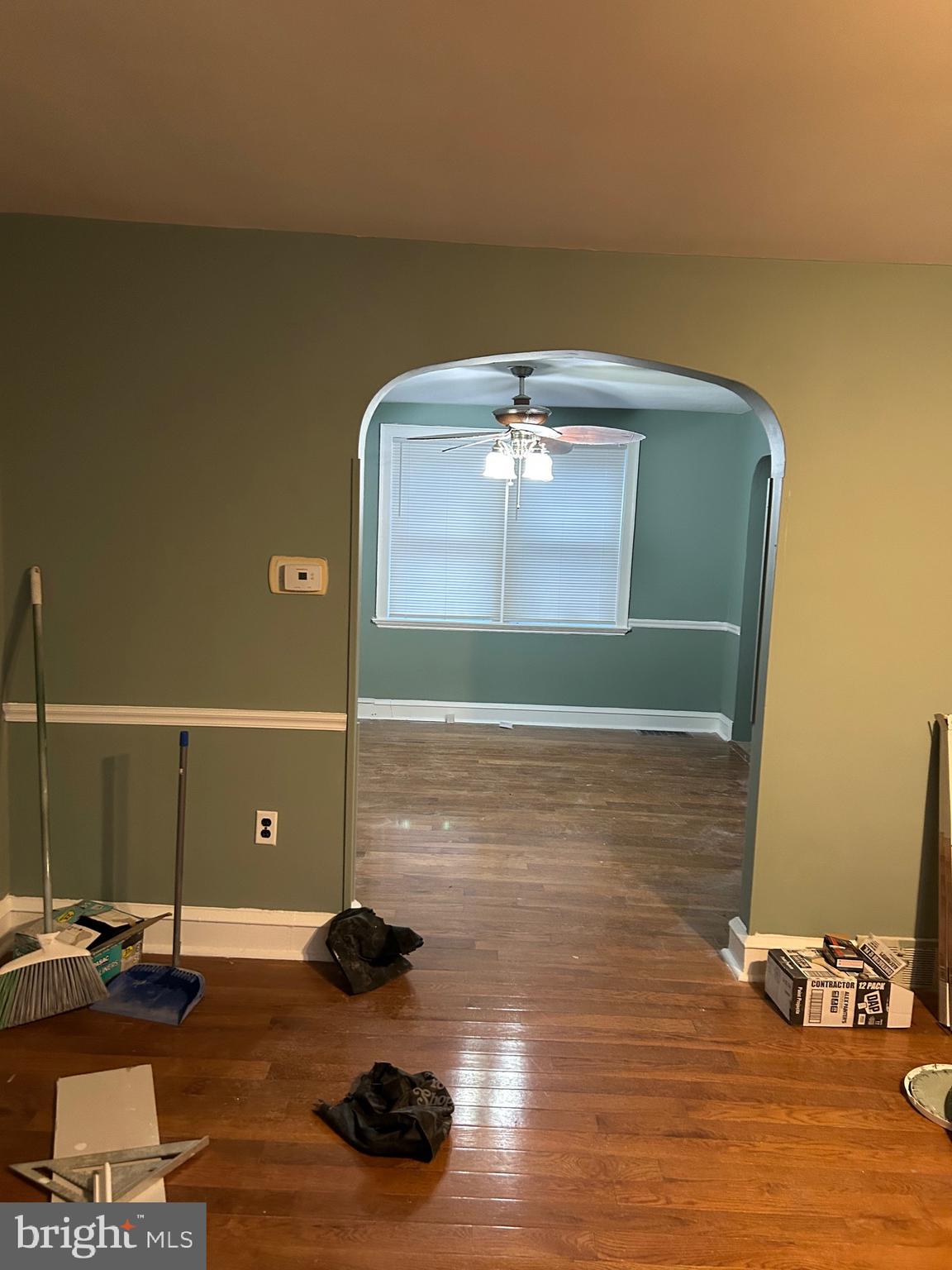 1567 Collings Road Camden, NJ 08104 - Photo 4 of 16 a room with wooden floor