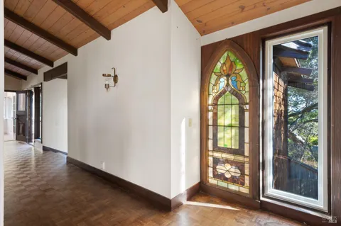 a kitchen with stainless steel appliances a stove microwave and cabinets