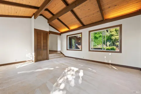 a view of a room with a large window