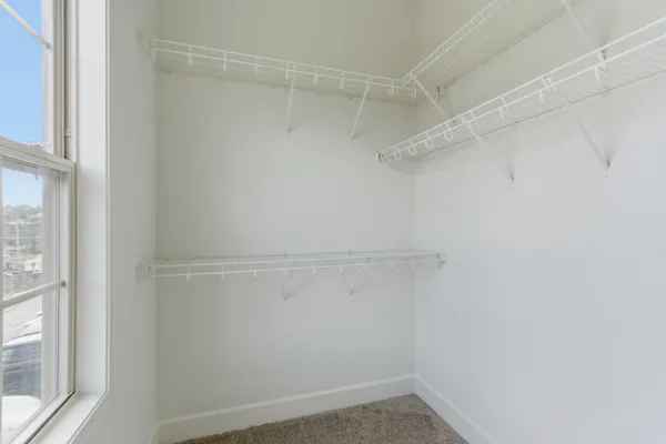 a view of a room with racks on the wall