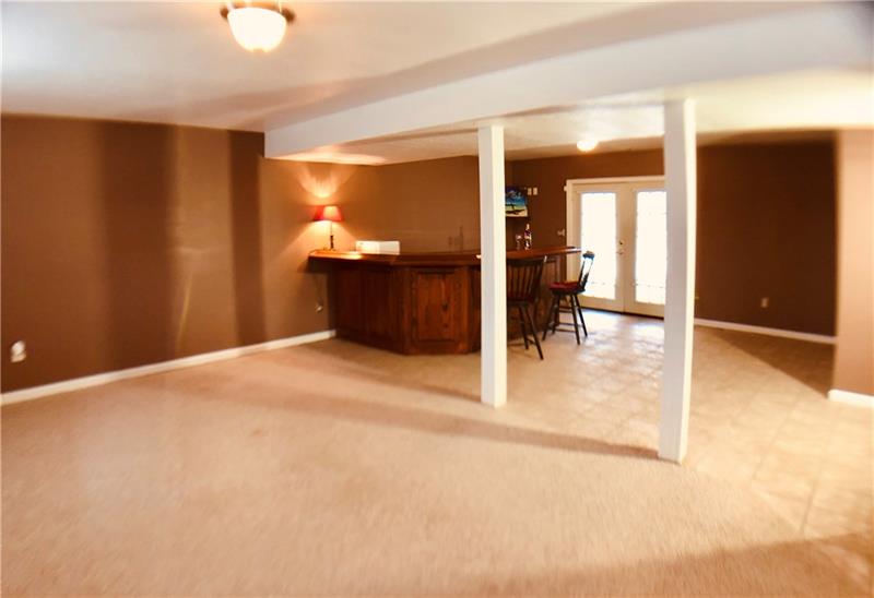 441 Whitestown Road Butler, PA 16001 - Photo 19 of 25 Generous family room with combination of carpet and ceramic tile. Room size 25 x 20