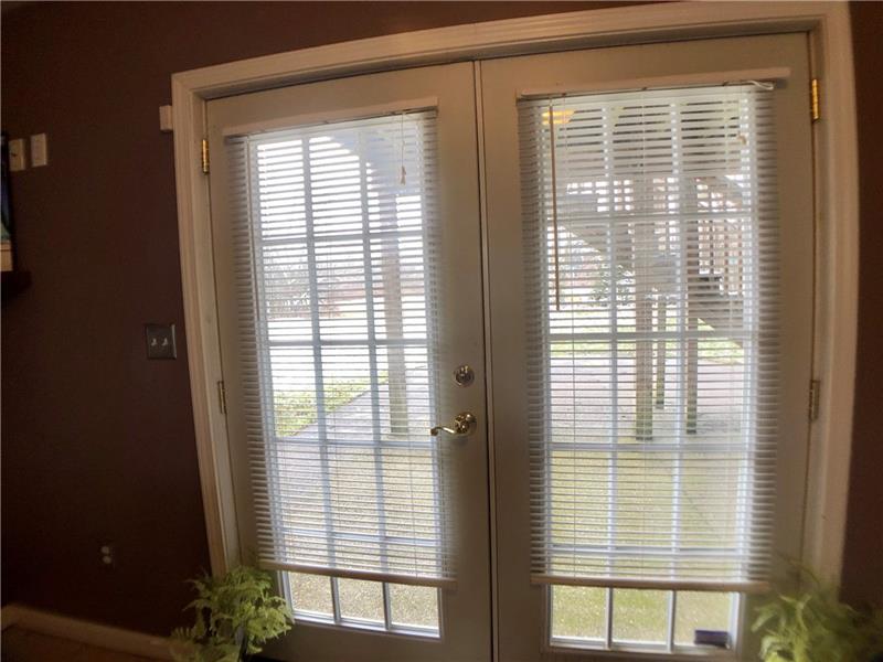 441 Whitestown Road Butler, PA 16001 - Photo 21 of 25 Bright and airy double French doors which lead to the covered patio.