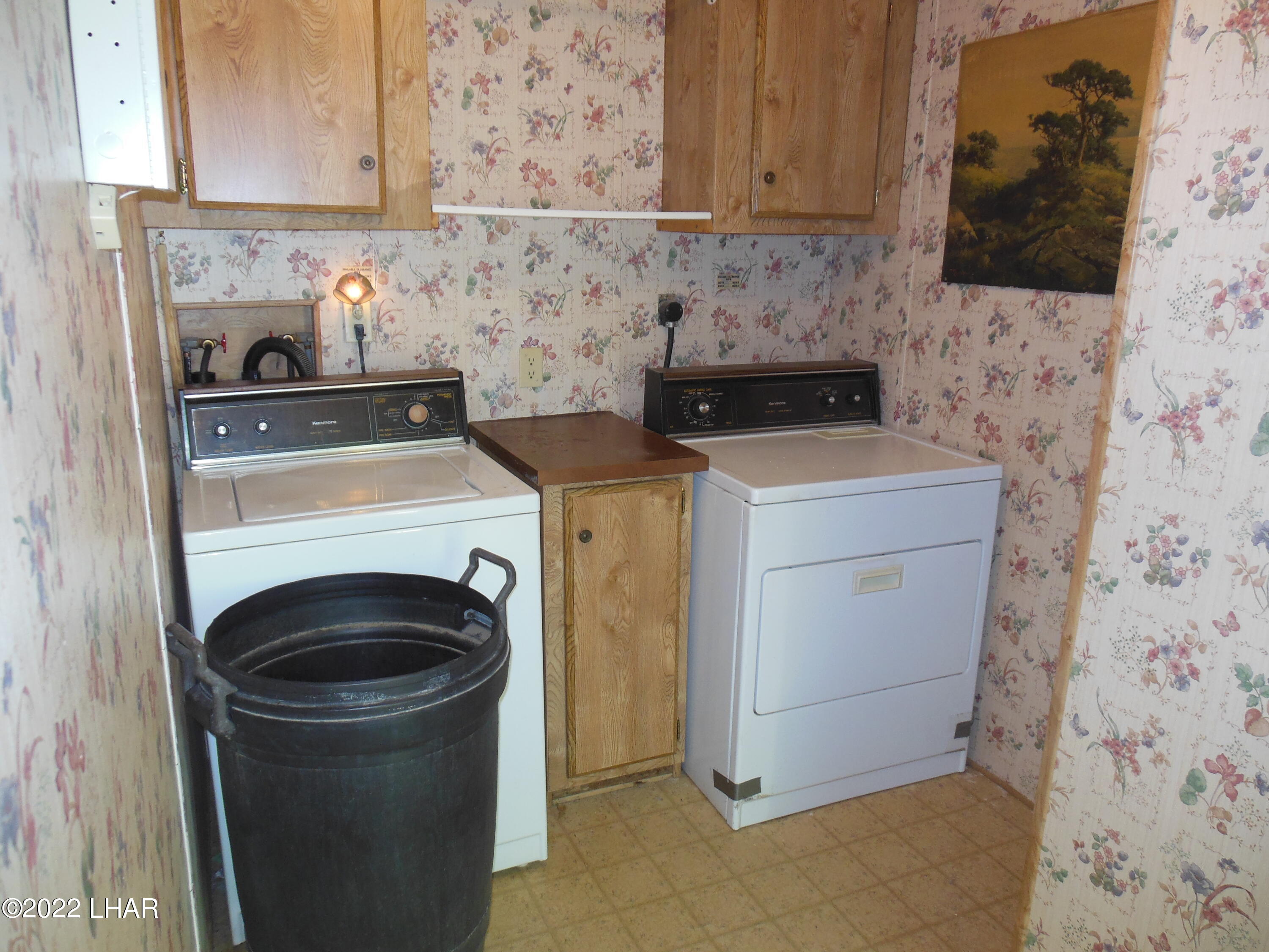 3744 North Bryce Road, Unit 54 Golden Valley, AZ 86413 - Photo 12 of 45 Laundry room with washer & dryer