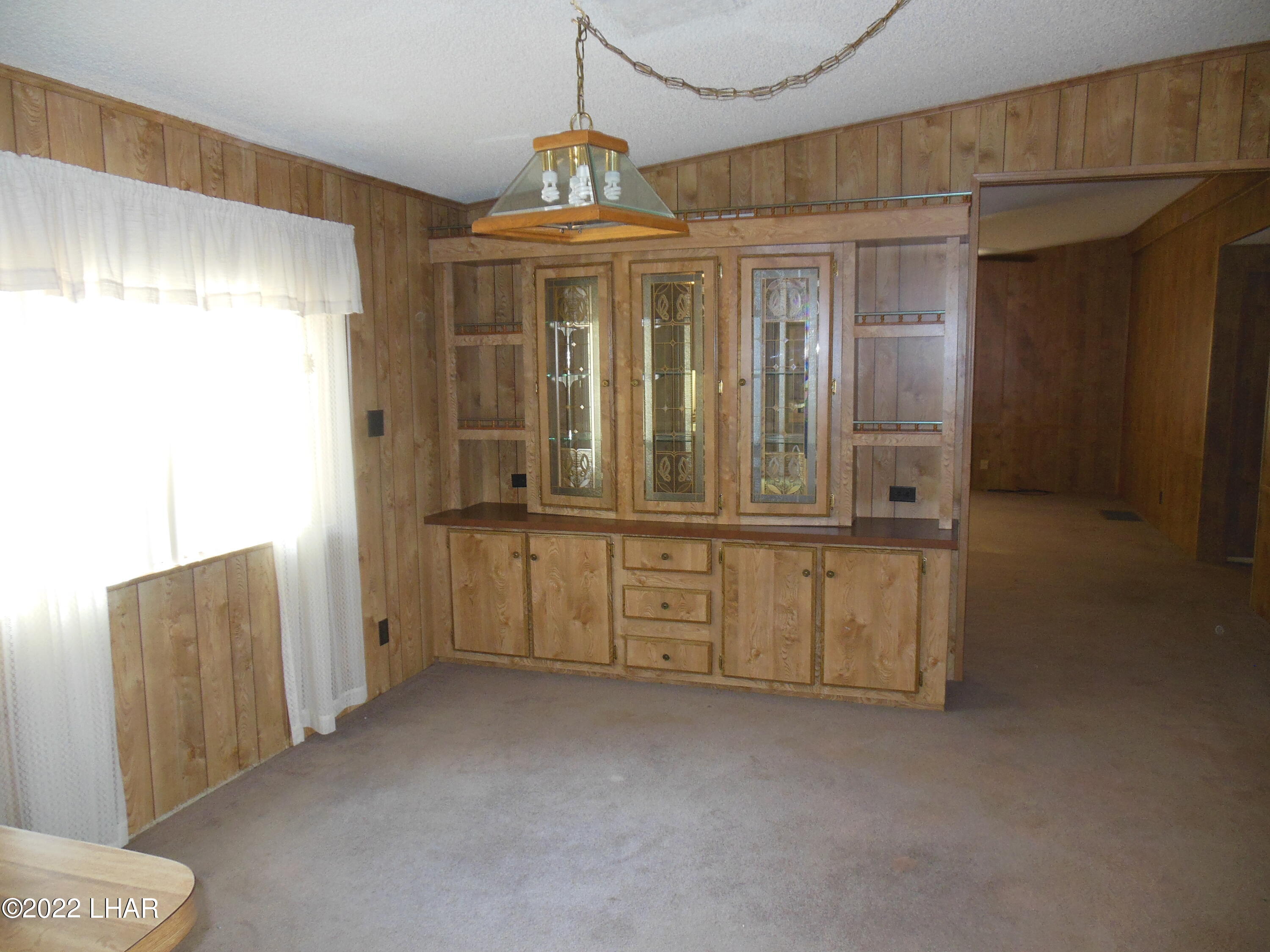 3744 North Bryce Road, Unit 54 Golden Valley, AZ 86413 - Photo 16 of 45 Hutch for all your fabulous stem ware