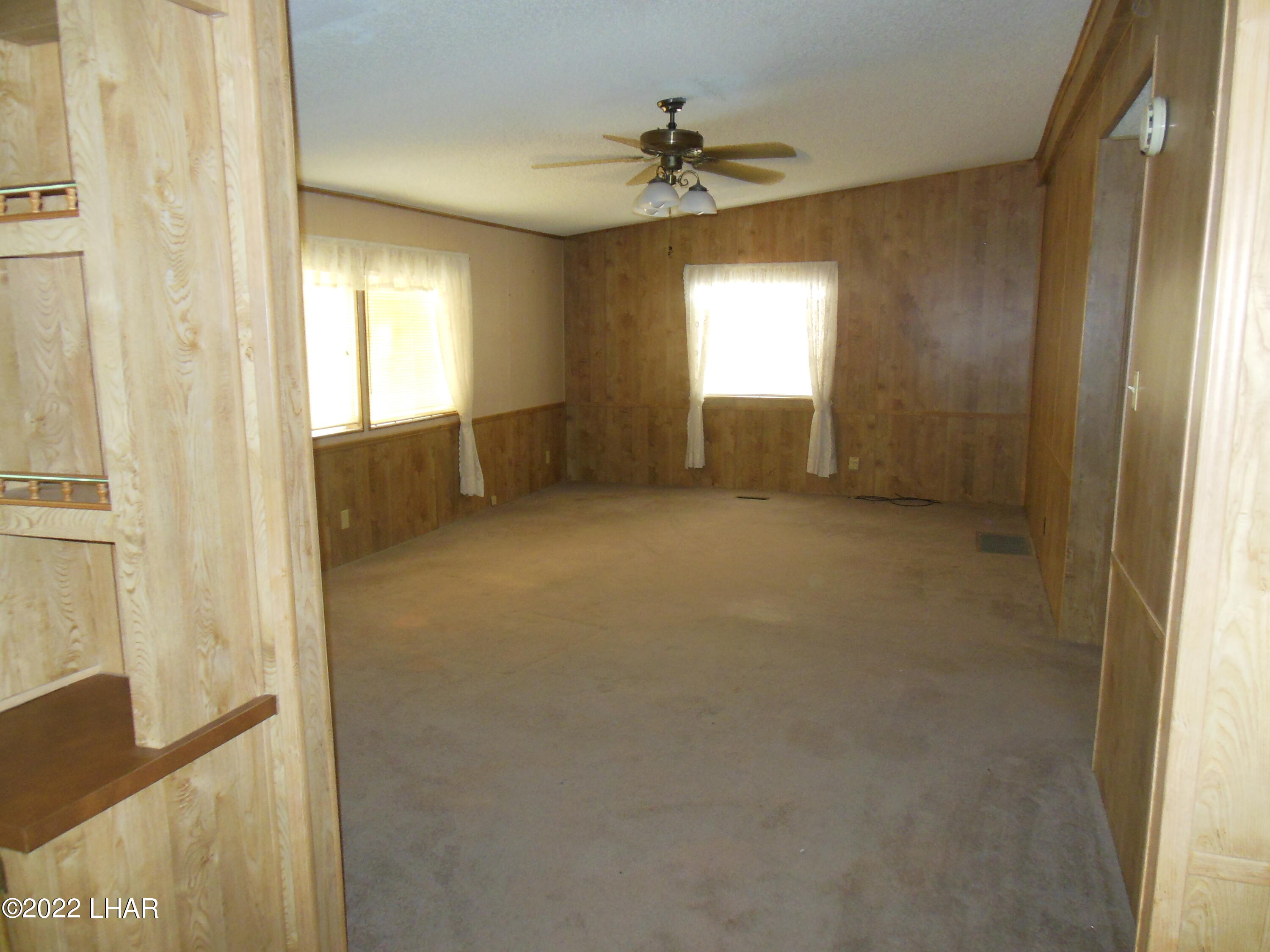 3744 North Bryce Road, Unit 54 Golden Valley, AZ 86413 - Photo 18 of 45 Looking from dining room area to the 2nd living room