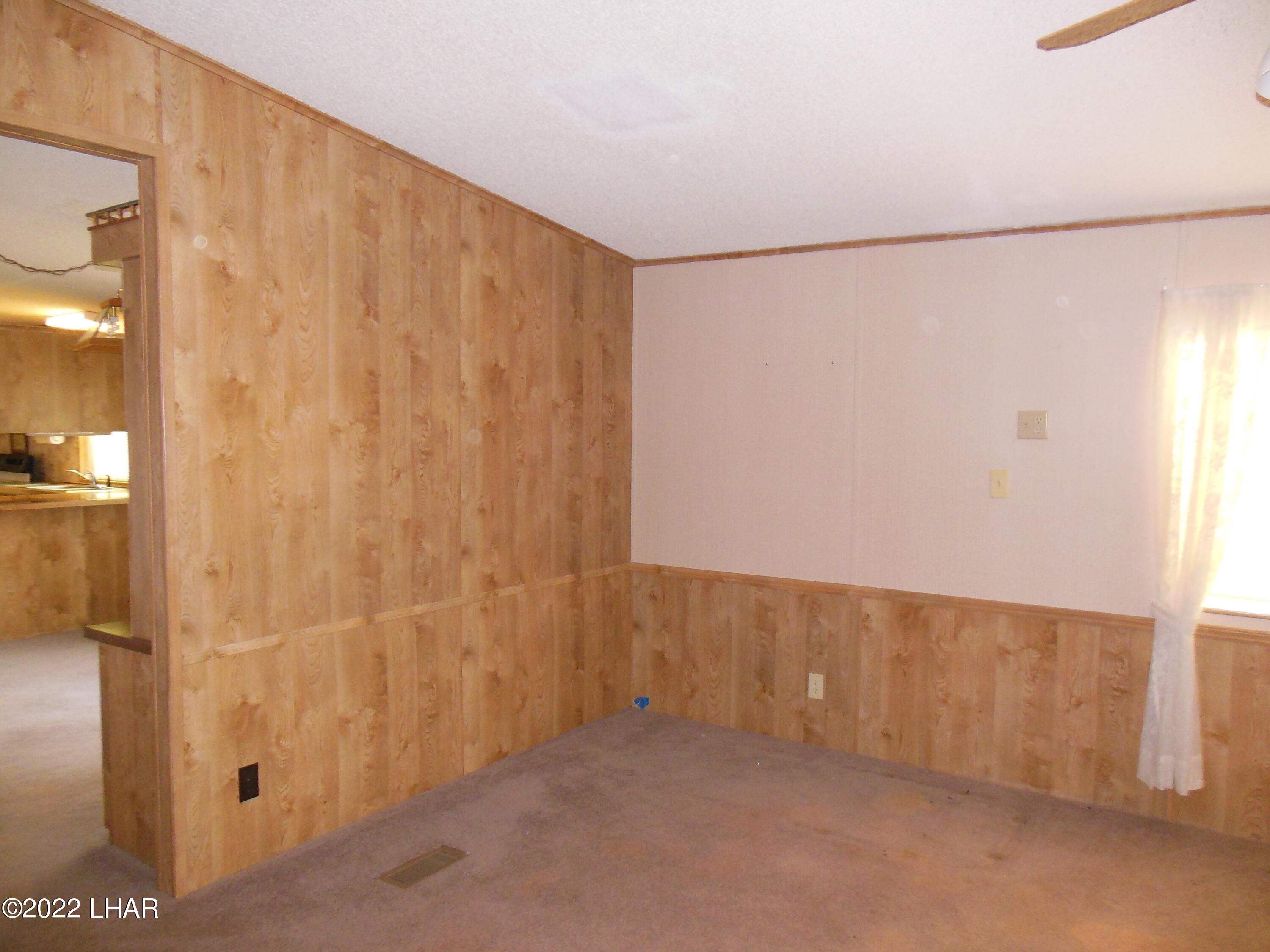 3744 North Bryce Road, Unit 54 Golden Valley, AZ 86413 - Photo 20 of 45 Back side of hutch in 2nd living room corner