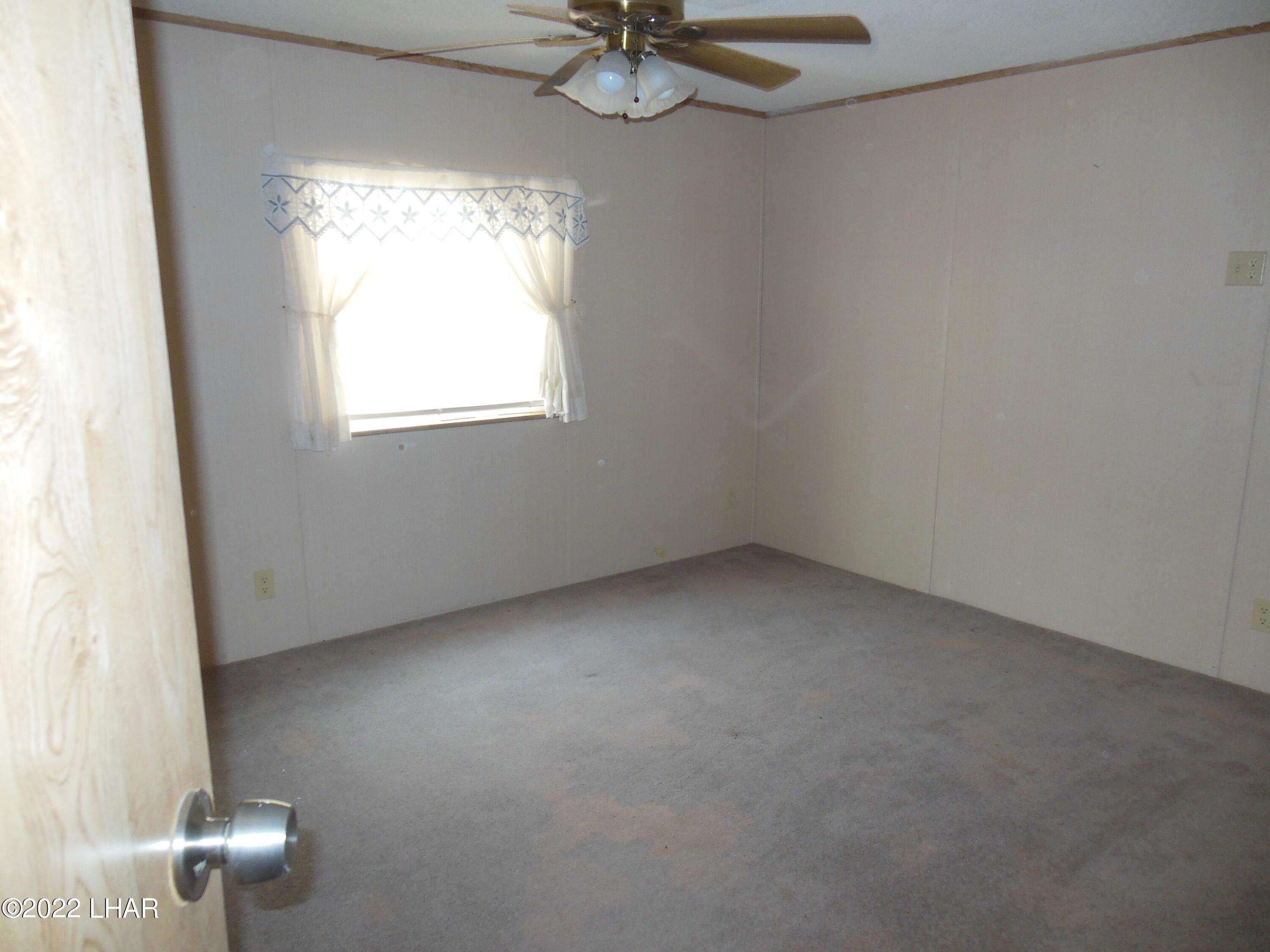 3744 North Bryce Road, Unit 54 Golden Valley, AZ 86413 - Photo 21 of 45 2nd guest bedroom
