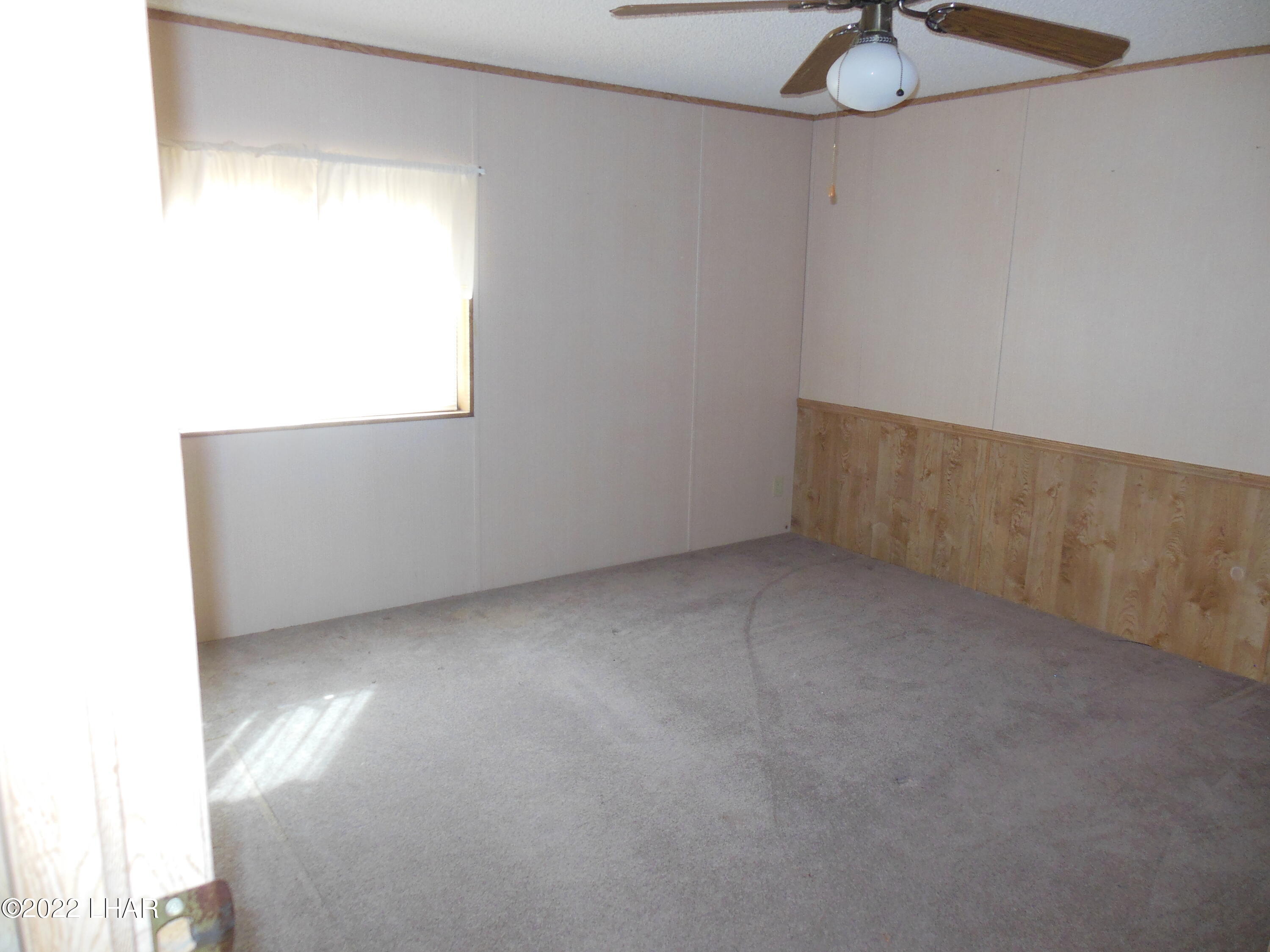 3744 North Bryce Road, Unit 54 Golden Valley, AZ 86413 - Photo 22 of 45 3rd bedroom