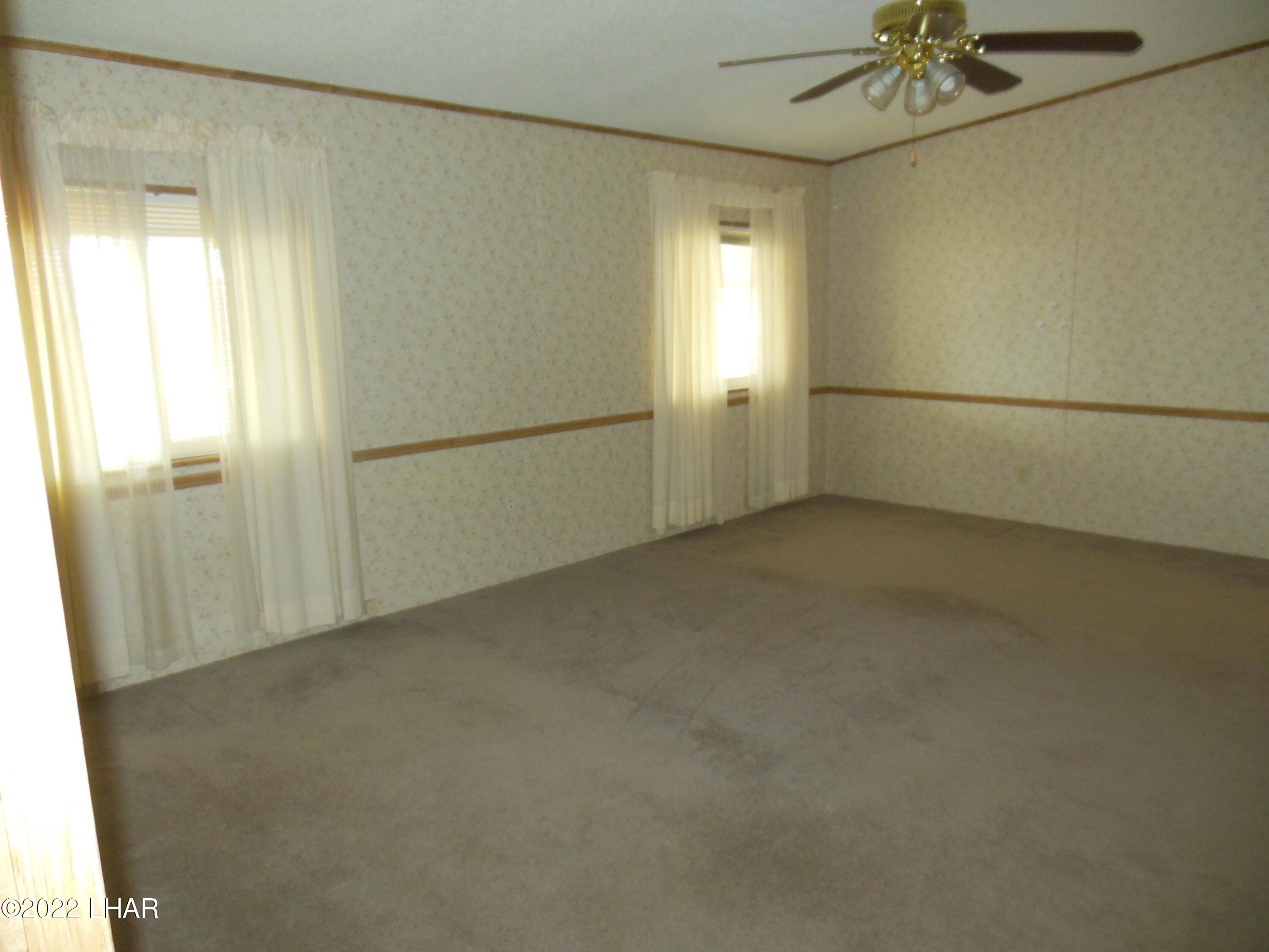 3744 North Bryce Road, Unit 54 Golden Valley, AZ 86413 - Photo 28 of 45 Mater bedroom