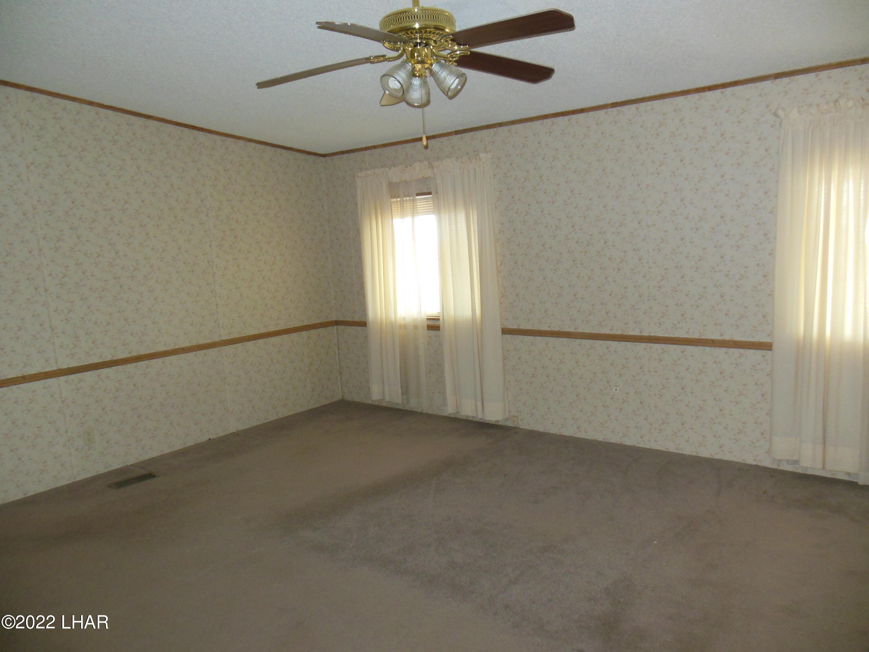 3744 North Bryce Road, Unit 54 Golden Valley, AZ 86413 - Photo 29 of 45 Other view master bedroom