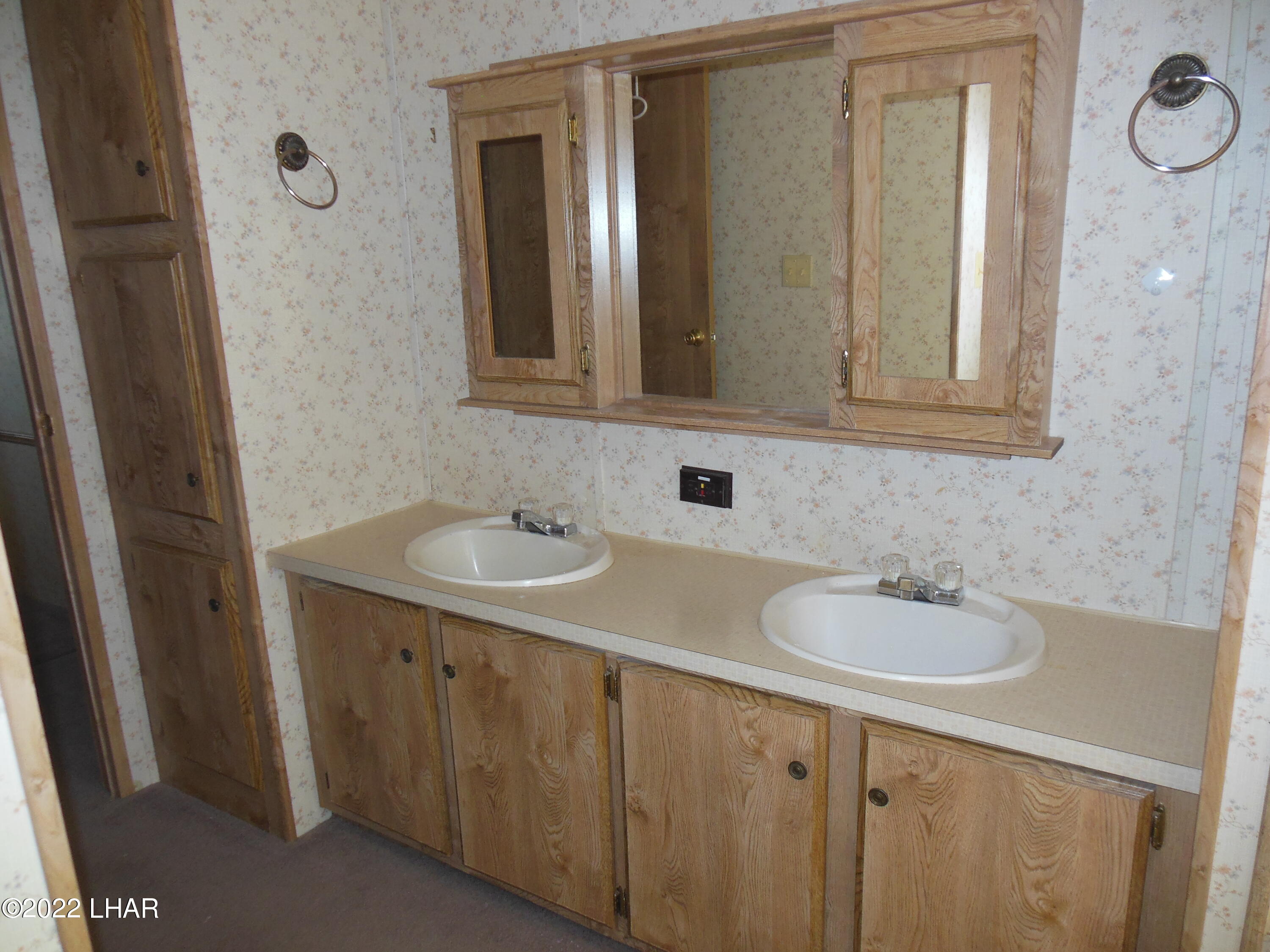3744 North Bryce Road, Unit 54 Golden Valley, AZ 86413 - Photo 33 of 45 Dual sinks i master bath